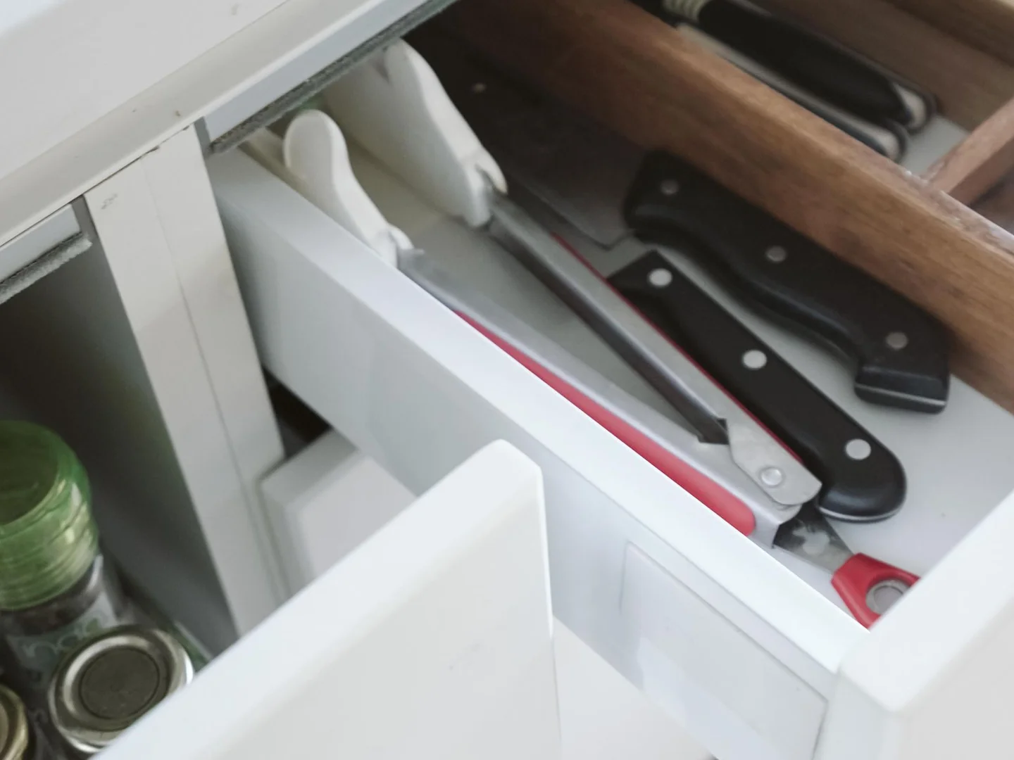 Small compartments dividing the contents of a drawer.