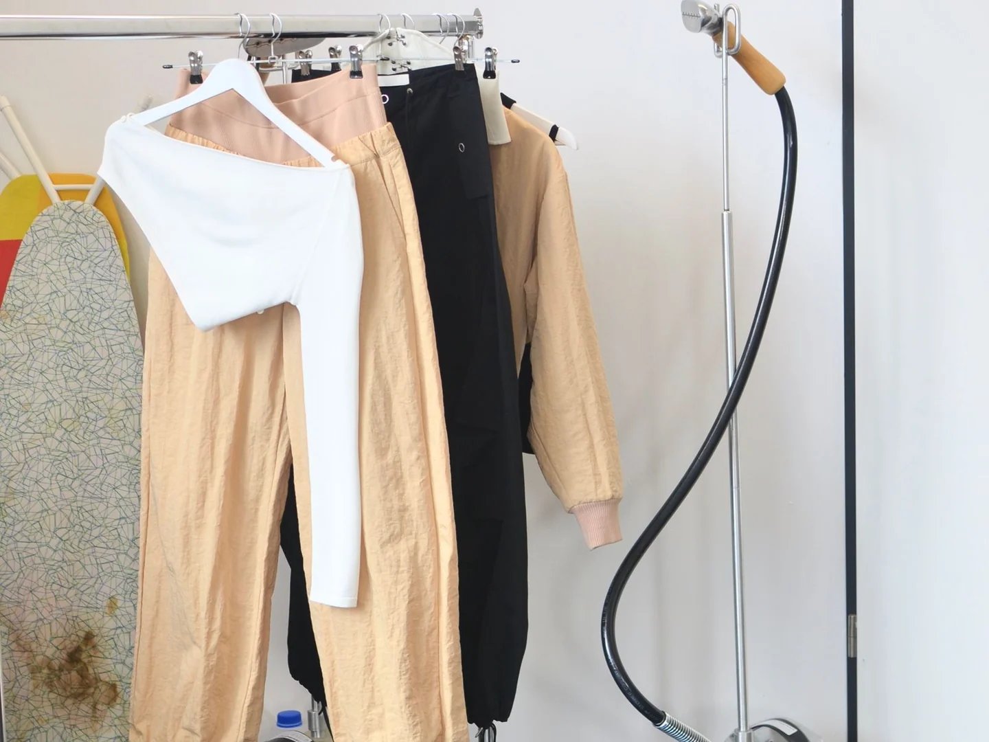 Clothes suspended from a hanging rail.